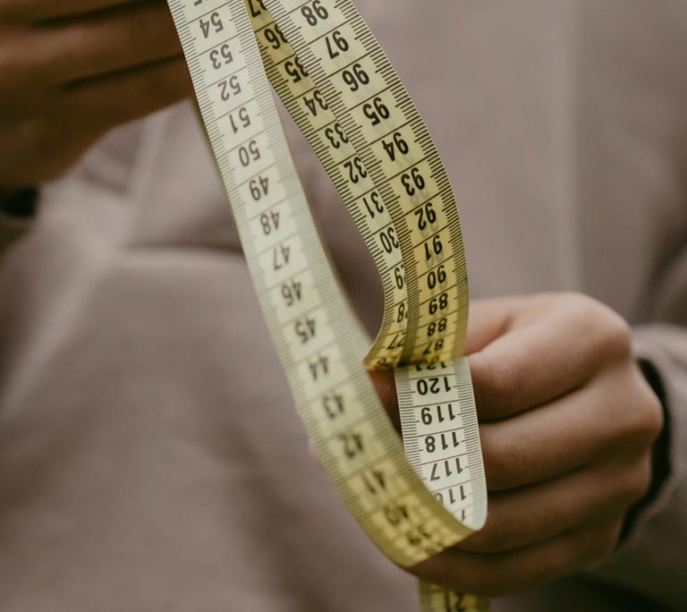 Male Eating Disorders. hands-measure